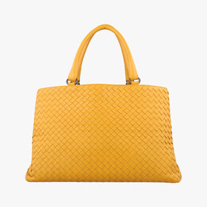 Pre-owned Bottega Veneta Intrecciato Yellow lambskin handbag | stylenewstar