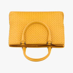 Pre-owned Bottega Veneta Intrecciato Yellow lambskin handbag | stylenewstar
