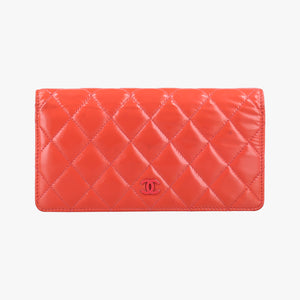 Pre-owned Chanel Quilted CC logo Orange Patent A31509 long-wallet | stylenewstar