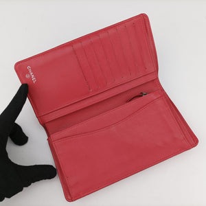 Pre-owned Chanel Quilted CC logo Orange Patent A31509 long-wallet | stylenewstar