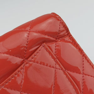 Pre-owned Chanel Quilted CC logo Orange Patent A31509 long-wallet | stylenewstar