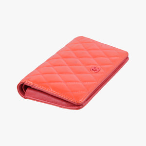 Pre-owned Chanel Quilted CC logo Orange Patent A31509 long-wallet | stylenewstar