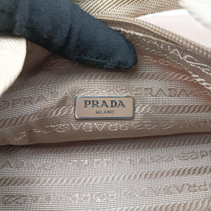 Pre-owned Prada Re-Edition 2005 Re-Nylon Bag Beige nylon 1BH204 handbag | stylenewstar