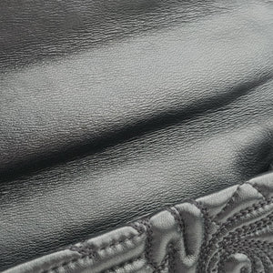 Vintage VERSACE Embossed Leather Talia Vanitas Black Leather handbag | stylenewstar