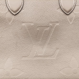 Pre-owned Louis Vuitton OntheGo MM Beige Monogram Empreinte M45607 shoulderbag | stylenewstar