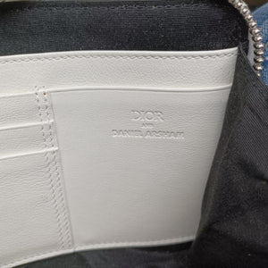 Secondhand Christian Dior Daniel Arsham collaboration Newspaper Print White Leather shoulderbag | stylenewstar