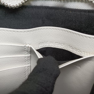 Secondhand Christian Dior Daniel Arsham collaboration Newspaper Print White Leather shoulderbag | stylenewstar