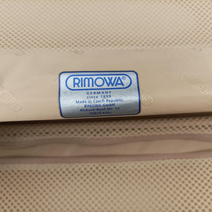 Secondhand RIMOWA TOPAS Red aluminum suitcase | stylenewstar