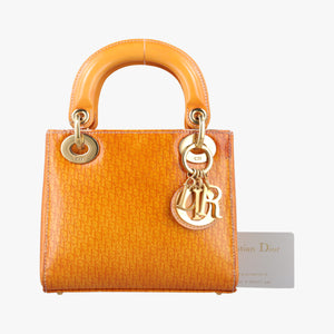 Pre-owned Christian Dior Lady Dior Mini Bag Yellow patent handbag | stylenewstar