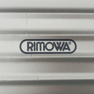 Pre-owned RIMOWA TOPAS Light Gold aluminum suitcase | stylenewstar