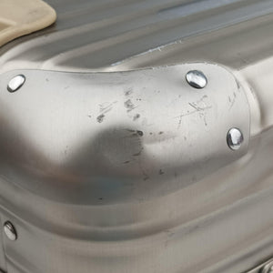 Pre-owned RIMOWA TOPAS Light Gold aluminum suitcase | stylenewstar