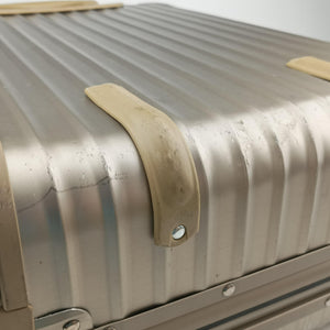 Pre-owned RIMOWA TOPAS Light Gold aluminum suitcase | stylenewstar