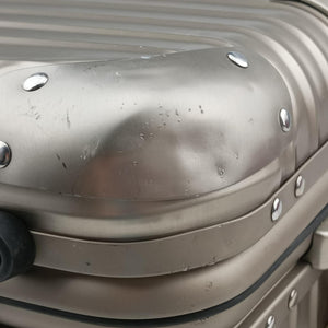Pre-owned RIMOWA TOPAS Light Gold aluminum suitcase | stylenewstar