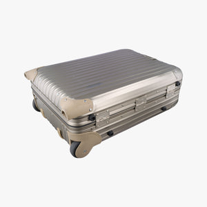 Pre-owned RIMOWA TOPAS Light Gold aluminum suitcase | stylenewstar