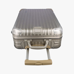Pre-owned RIMOWA TOPAS Light Gold aluminum suitcase | stylenewstar