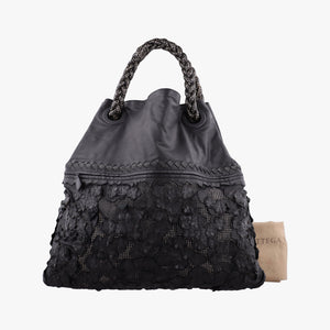 Vintage Bottega Veneta Laser-cut Floral Applique Limited Edition Black Leather handbag | stylenewstar
