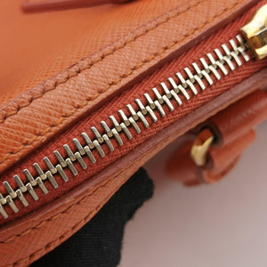 Secondhand Prada bowling Orange SAFFIANO Leather shoulderbag | stylenewstar