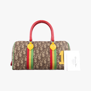 Secondhand Christian Dior Rasta Brown x Multicolor PVC-coated canvas x leather handbag | stylenewstar