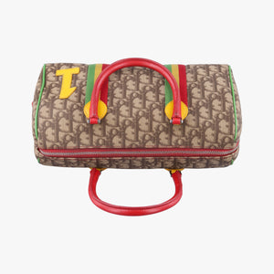 Secondhand Christian Dior Rasta Brown x Multicolor PVC-coated canvas x leather handbag | stylenewstar