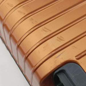 Pre-owned RIMOWA TOPAS Orange aluminum suitcase | stylenewstar