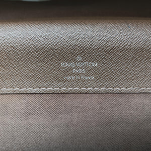 Pre-owned Louis Vuitton Serviette Moskova Grizzly Taiga M31058 handbag | stylenewstar