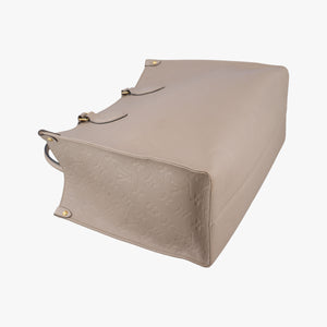 Secondhand Louis Vuitton OntheGo MM Beige Monogram Empreinte M45607 shoulderbag | stylenewstar