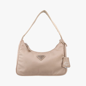Pre-owned Prada Re-Edition 2005 Re-Nylon Bag Beige nylon 1BH204 handbag | stylenewstar