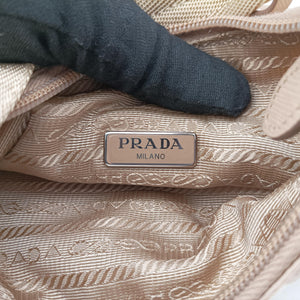 Pre-owned Prada Re-Edition 2005 Re-Nylon Bag Beige nylon 1BH204 handbag | stylenewstar