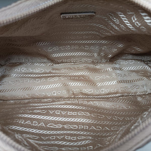 Pre-owned Prada Re-Edition 2005 Re-Nylon Bag Beige nylon 1BH204 handbag | stylenewstar