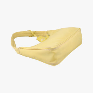 Secondhand Prada Re-Edition2000 Yellow nylon 1NE515 handbag | stylenewstar