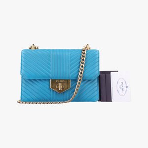 Pre-owned Prada Turn lock Chevron Impunture Autre Cuir Blue Leather shoulderbag | stylenewstar