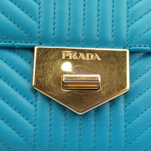 Pre-owned Prada Turn lock Chevron Impunture Autre Cuir Blue Leather shoulderbag | stylenewstar