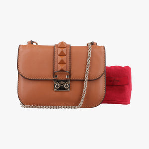 Vintage Valentino Rockstud Glam Lock Orange Leather shoulderbag | stylenewstar