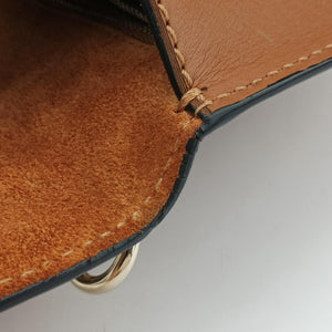 Vintage Valentino Rockstud Glam Lock Orange Leather shoulderbag | stylenewstar