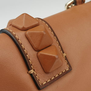 Vintage Valentino Rockstud Glam Lock Orange Leather shoulderbag | stylenewstar
