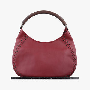 Pre-owned Christian Dior Ethnic Hobo Red Leather handbag | stylenewstar