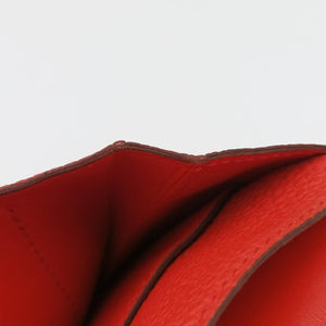 Secondhand Hermes Dogon Duo Orange Togo clutchbag | stylenewstar