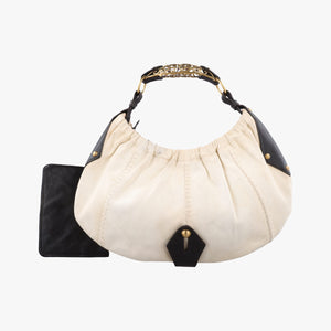 Secondhand Yves Saint Laurent Mombasa White canvas 151211 handbag | stylenewstar