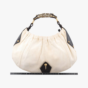 Secondhand Yves Saint Laurent Mombasa White canvas 151211 handbag | stylenewstar