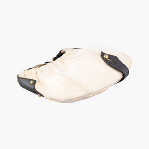 Secondhand Yves Saint Laurent Mombasa White canvas 151211 handbag | stylenewstar