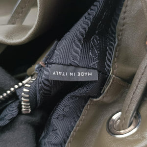 Pre-owned Prada Triangle logo Green Leather BZ032L backpack/rucksack | stylenewstar