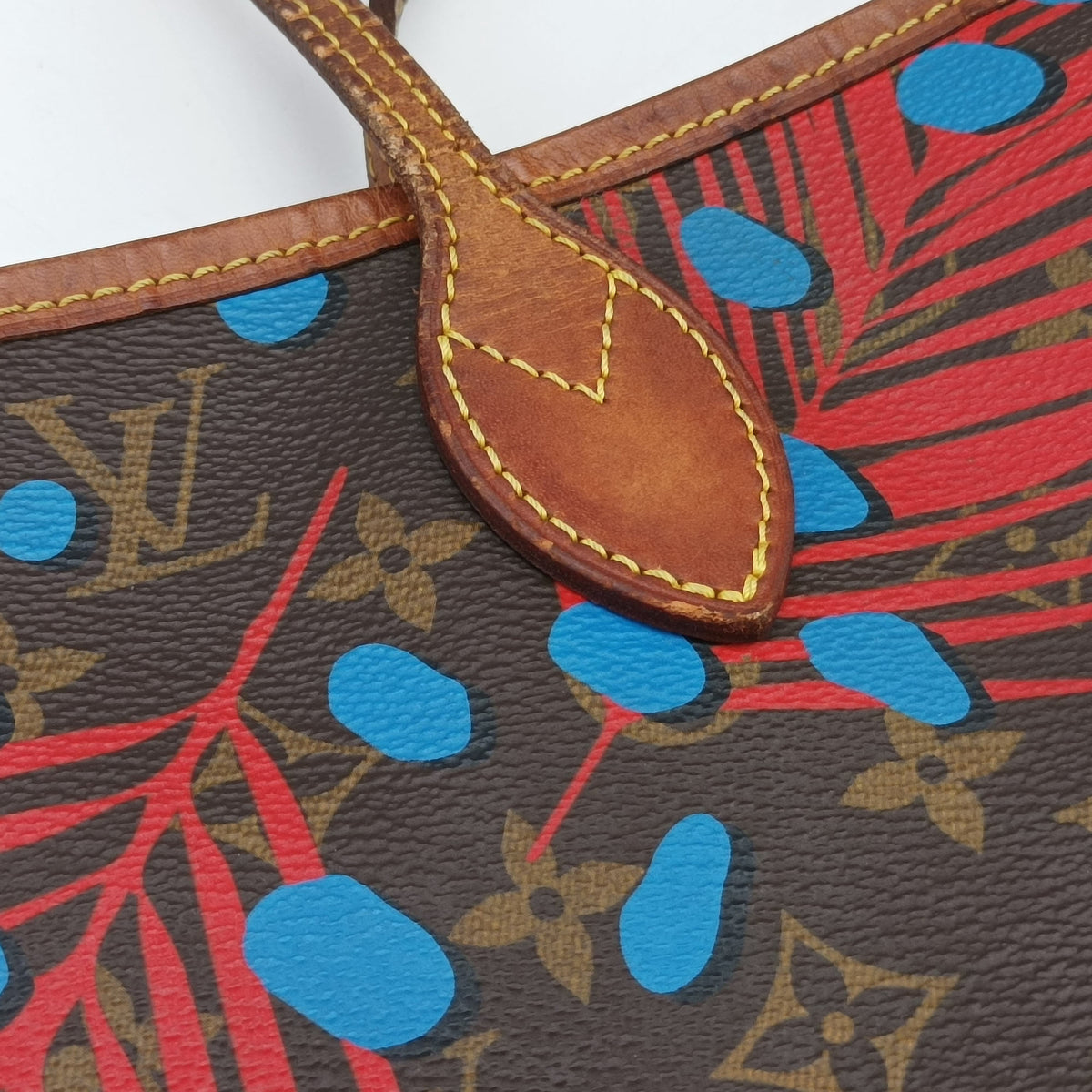 Secondhand Louis Vuitton Neverfull MM Brown x Poppy Denim Monogram Jungle Dot M41978 shoulderbag | stylenewstar