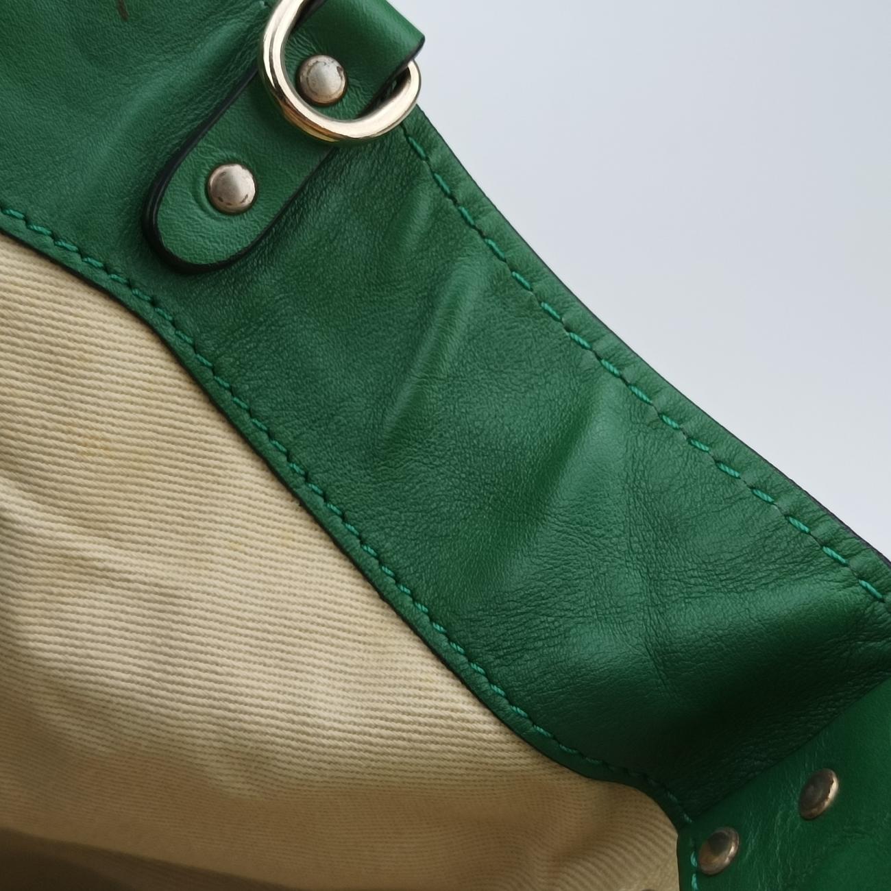 RockstudGreenLeatherLot number unknown