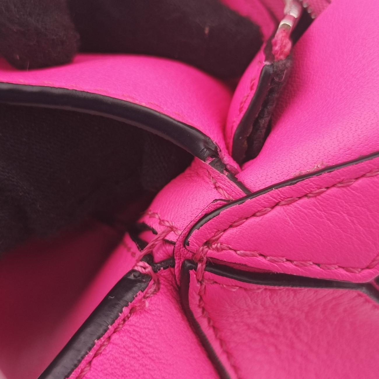 Puzzle Pink Leather 052140