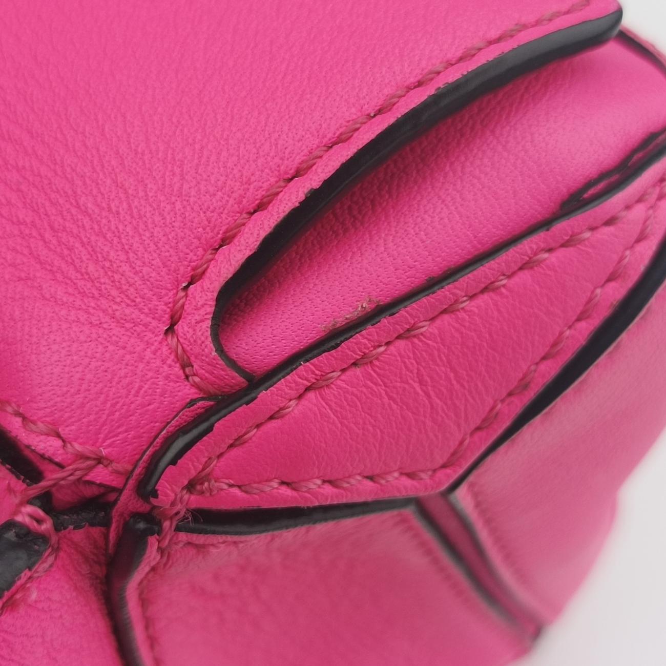 Puzzle Pink Leather 052140