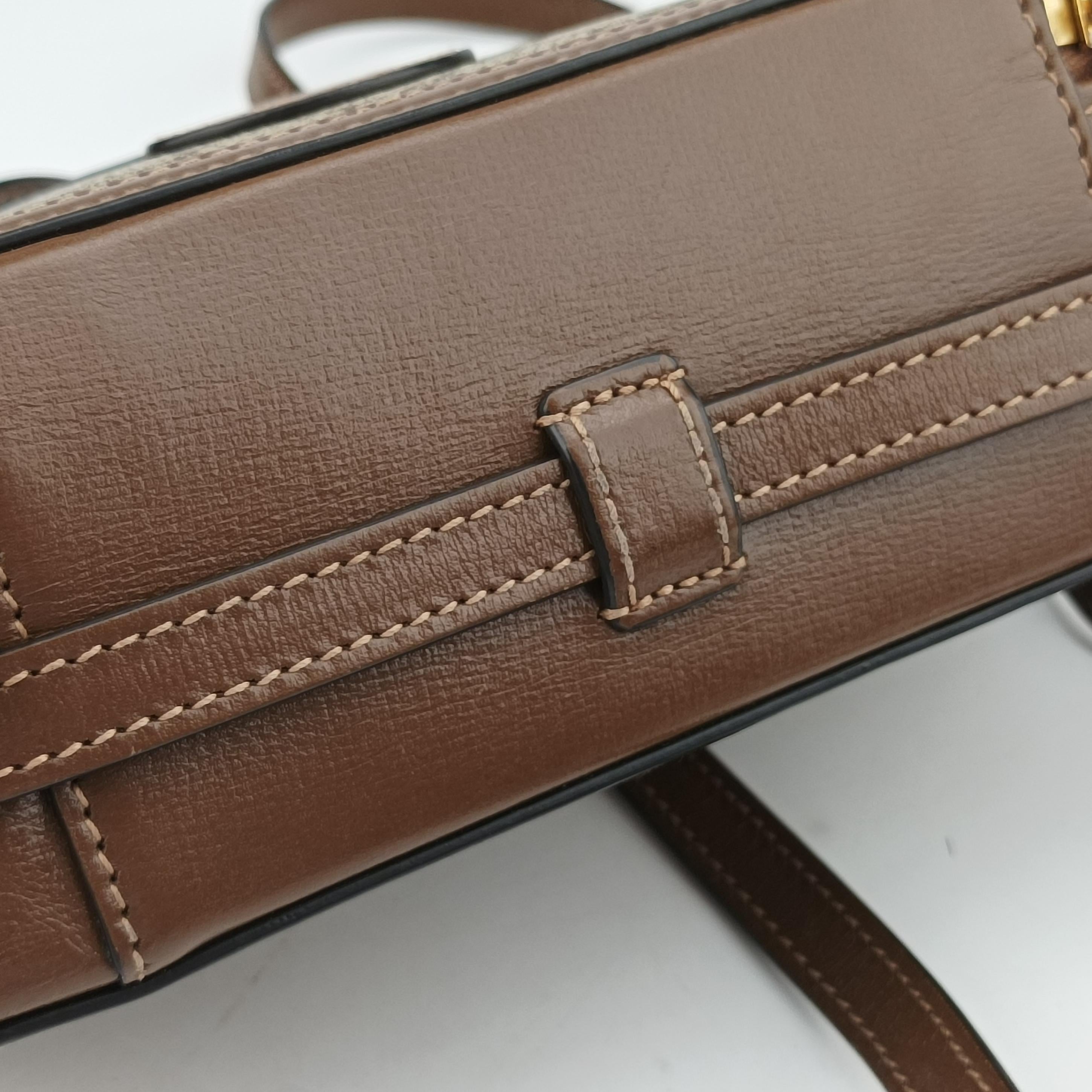 Pre-owned Gucci Interlocking G Brown PVC coated canvas 671674 shoulderbag | stylenewstar