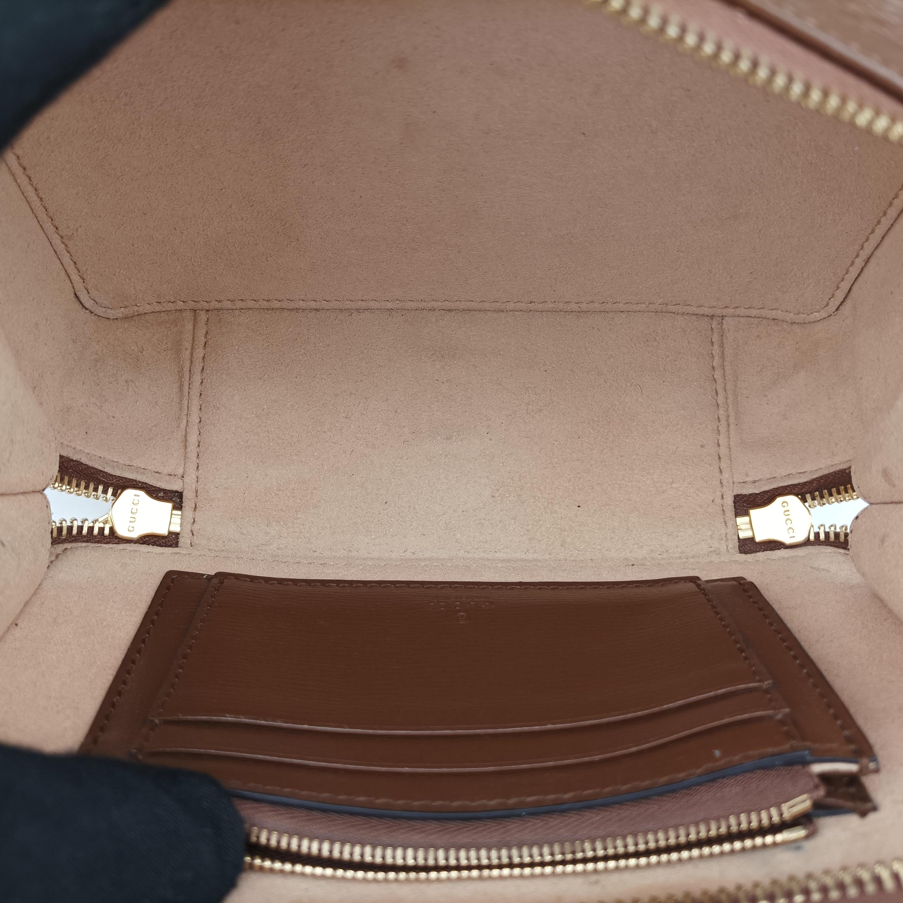 Pre-owned Gucci Interlocking G Brown PVC coated canvas 671674 shoulderbag | stylenewstar