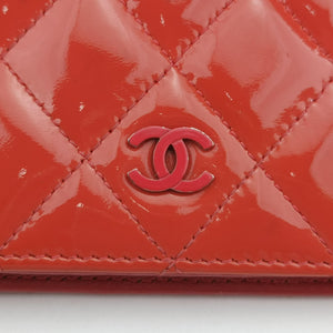 Pre-owned Chanel Quilted CC logo Orange Patent A31509 long-wallet | stylenewstar