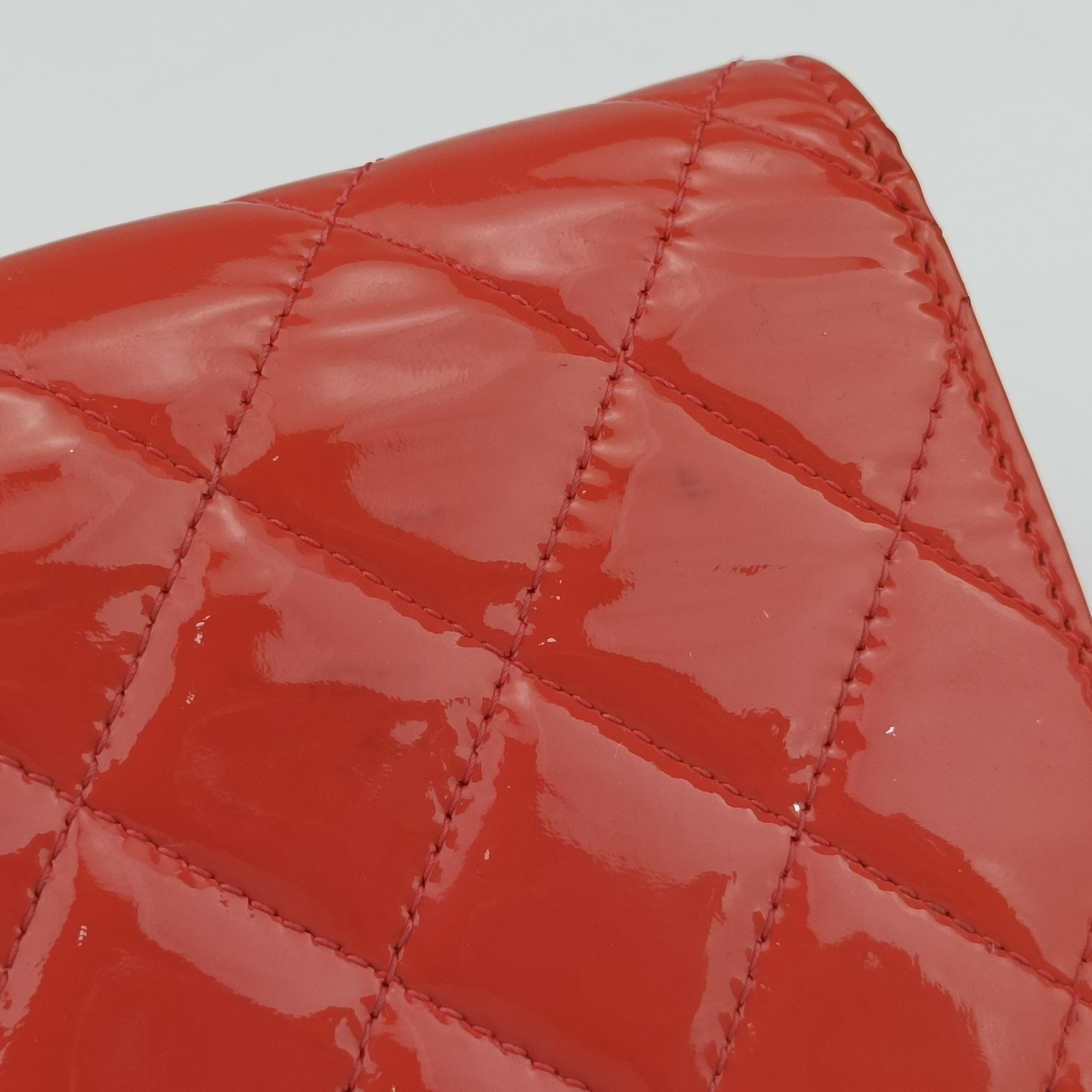 Pre-owned Chanel Quilted CC logo Orange Patent A31509 long-wallet | stylenewstar