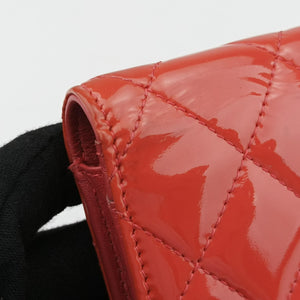Pre-owned Chanel Quilted CC logo Orange Patent A31509 long-wallet | stylenewstar